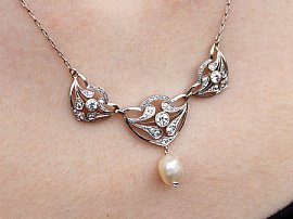 Wearing Natural Pearl and Diamond Pendant Platinum
