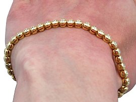 Wearing Yellow Gold Diamond Tennis Bracelet