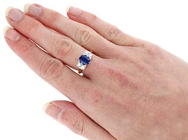 Wearing Sapphire Diamond Ring on hand 