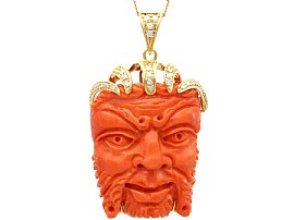 112 ct Coral and Diamond Mask Pendant in 18ct Yellow Gold