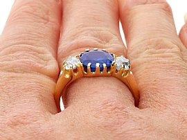 Wearing Ceylon Sapphire Trilogy Ring for Sale