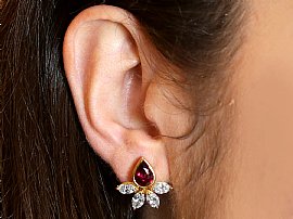 vintage ruby and diamond earrings for sale wearing 