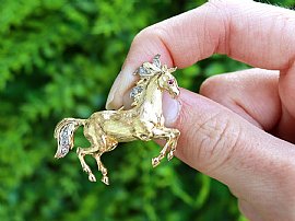 Yellow Gold and Diamond Horse Brooch Outside