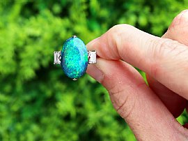 cabochon black opal and diamond ring for sale outside