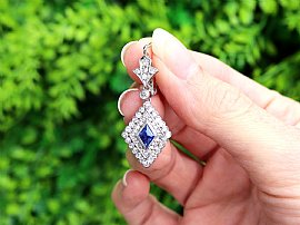 lozenge cut sapphire earrings with diamonds outside