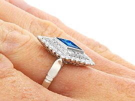 lozenge cut sapphire earrings with diamonds set