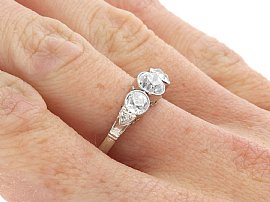 platinum trilogy engagement ring for sale wearing 
