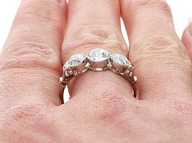 platinum trilogy engagement ring for sale wearing 