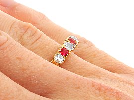 Wearing Five Stone Ruby and Diamond Ring Close up 