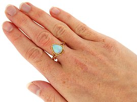 Cabochon Opal Ring in Yellow Gold for Sale Wearing 