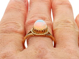 Wearing Cabochon Opal Ring in Yellow Gold for Sale