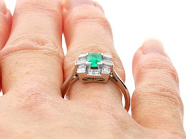 Wearing 0.50 Carat Emerald Ring with Diamonds