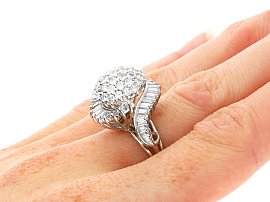 Diamond Cluster Ring with Baguettes Being Worn