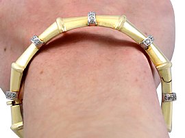 Art Deco Style Bangle in Gold with Diamonds Wearing