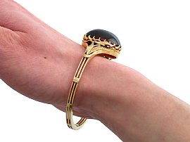 Garnet Bangle Bracelet in Gold for Sale Wearing