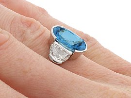 wearing aquamarine ring with diamonds