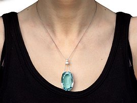 Oval Aquamarine Pendant Necklace in Gold Wearing