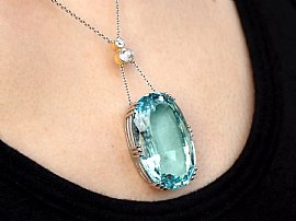 Oval Aquamarine Pendant Necklace in Gold Wearing