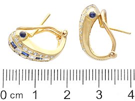 Yellow Gold Sapphire and Diamond Earrings ruler