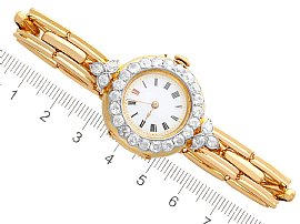 Ladies Yellow Gold Watch with Diamonds ruler