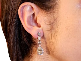 Wearing Pear Cut Diamond Drop Earrings