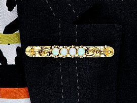Wearing Art Nouveau Opal Gold Bar Brooch on Lapel