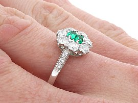 Emerald Cut Emerald Ring with Diamonds wearing 