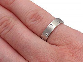 Diamond and White Gold Band Wearing Hand