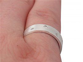 Diamond and White Gold Band Wearing Finger 