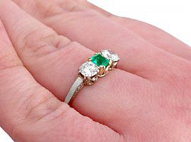 Emerald and Diamond Three Stone Ring Wearing Hand