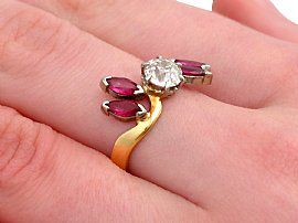 ruby and diamond ring on finger